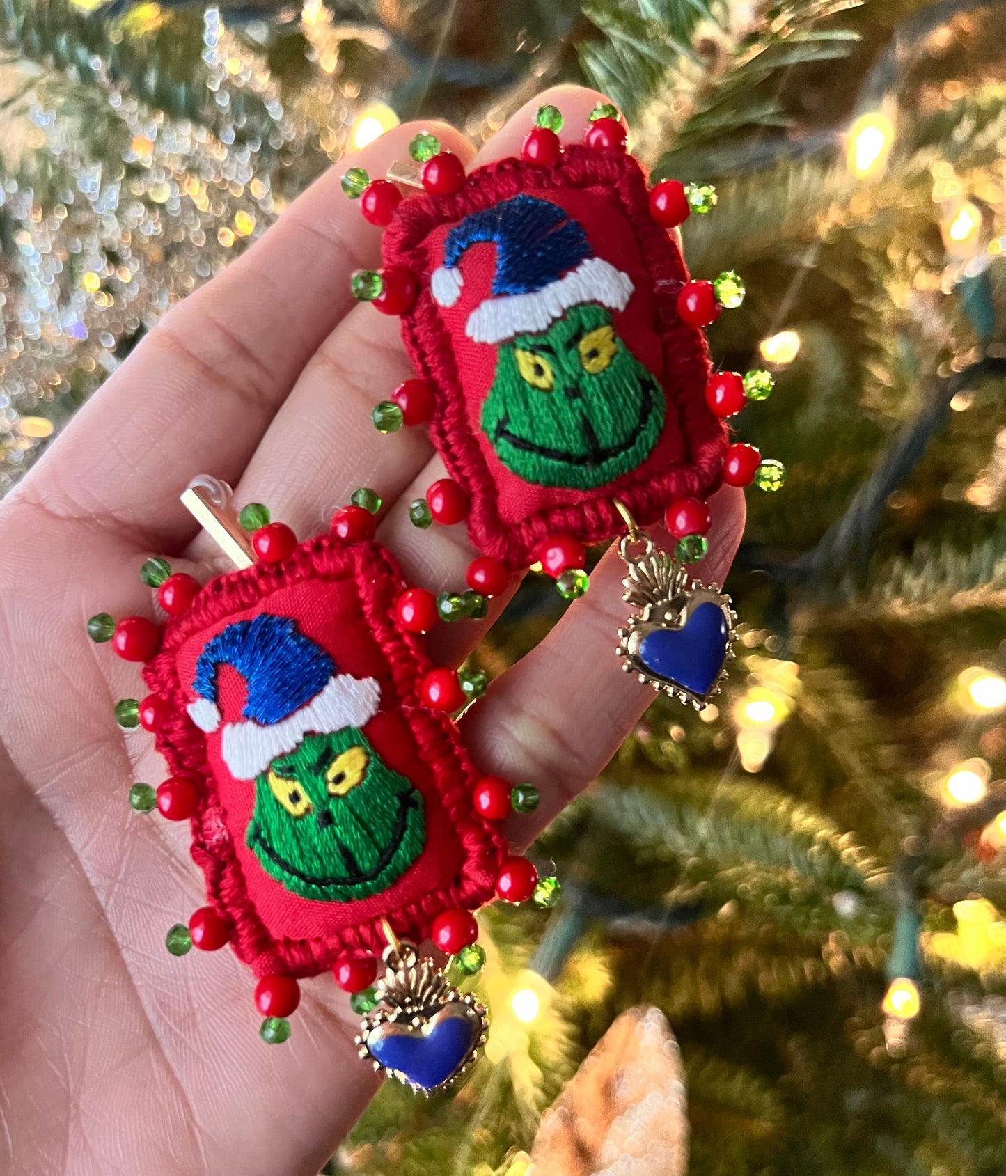 Grinch earrings.