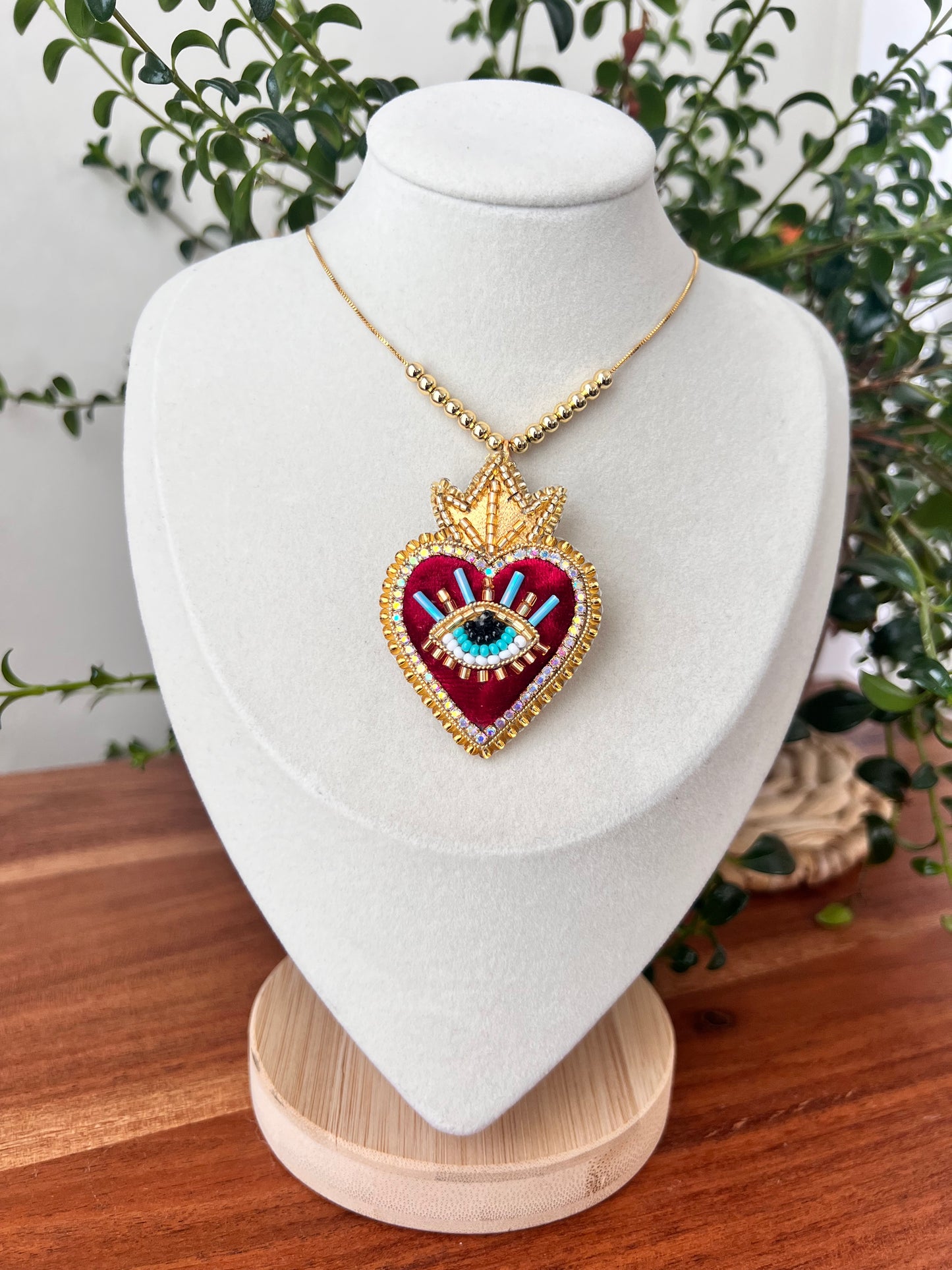 Sacred heart ojito necklace.